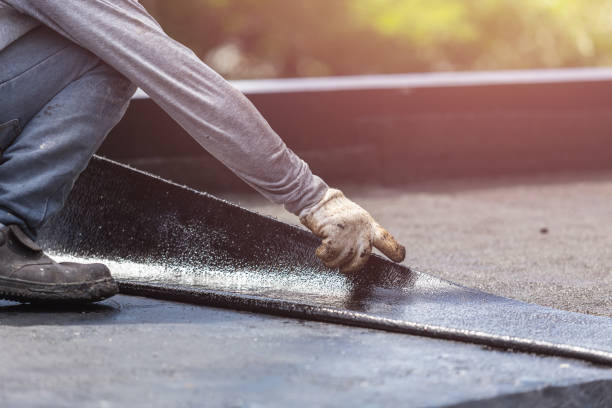 Professional Exterior Waterproofing technician working in Mineola, NY